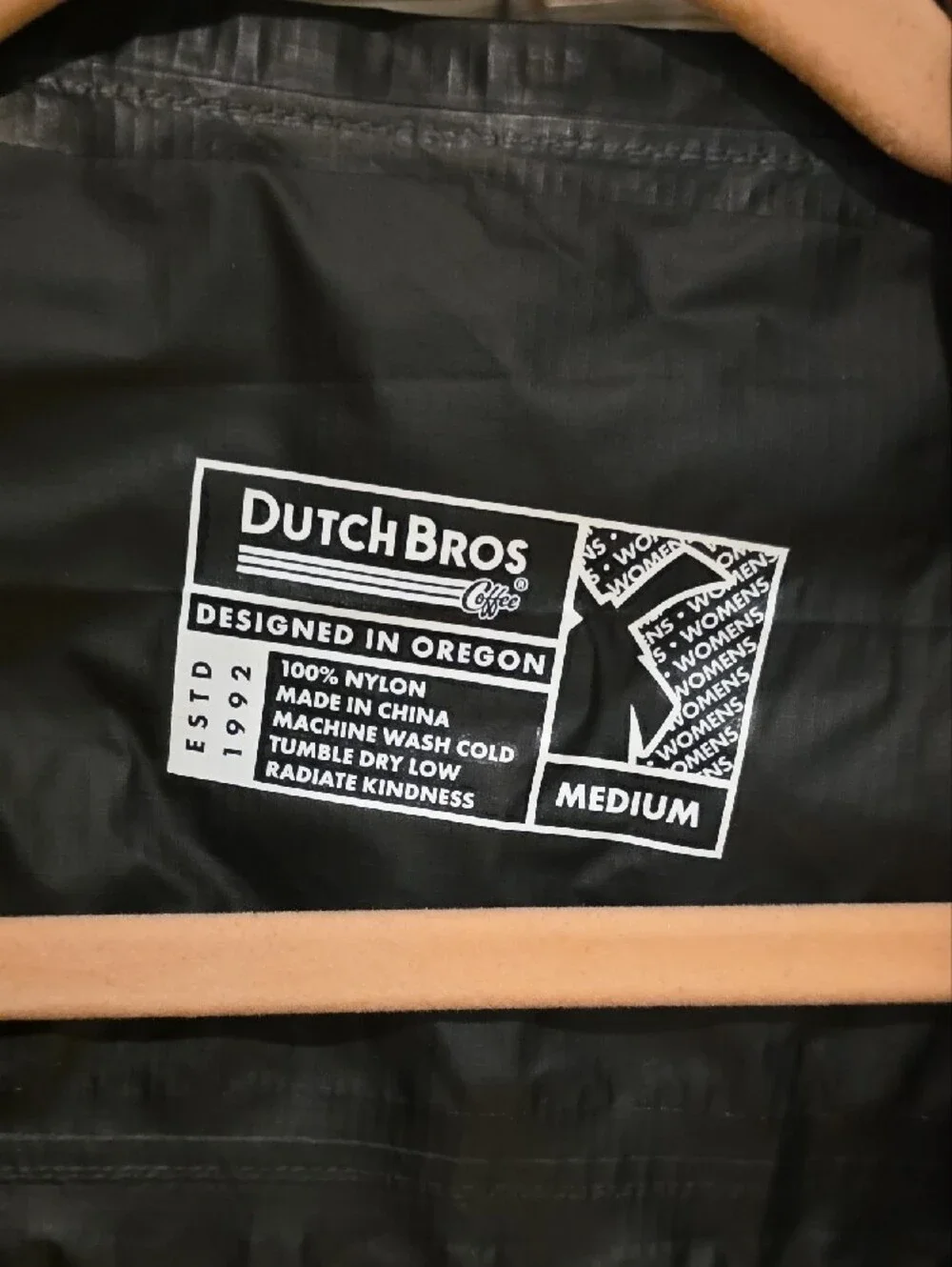 Dutch Bros Beige Windbreaker with Orange Trim